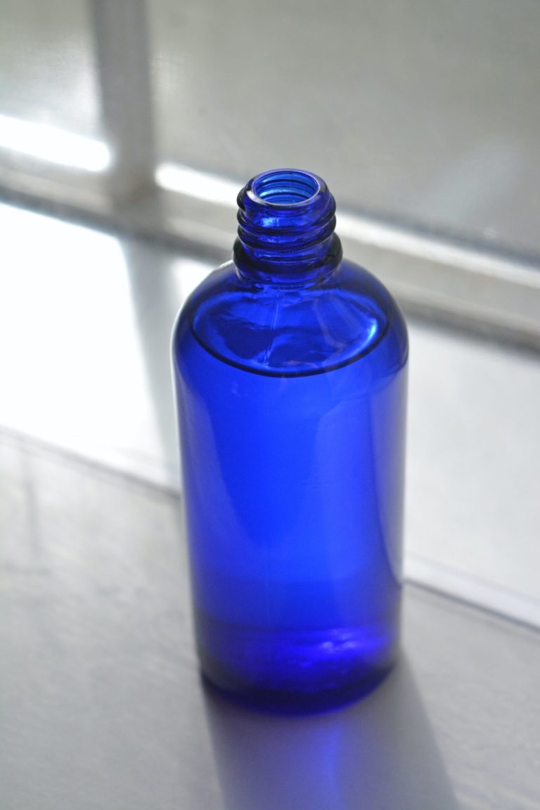 a blue plastic bottle