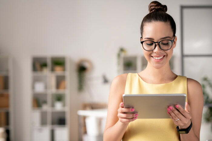 a woman holding a phone