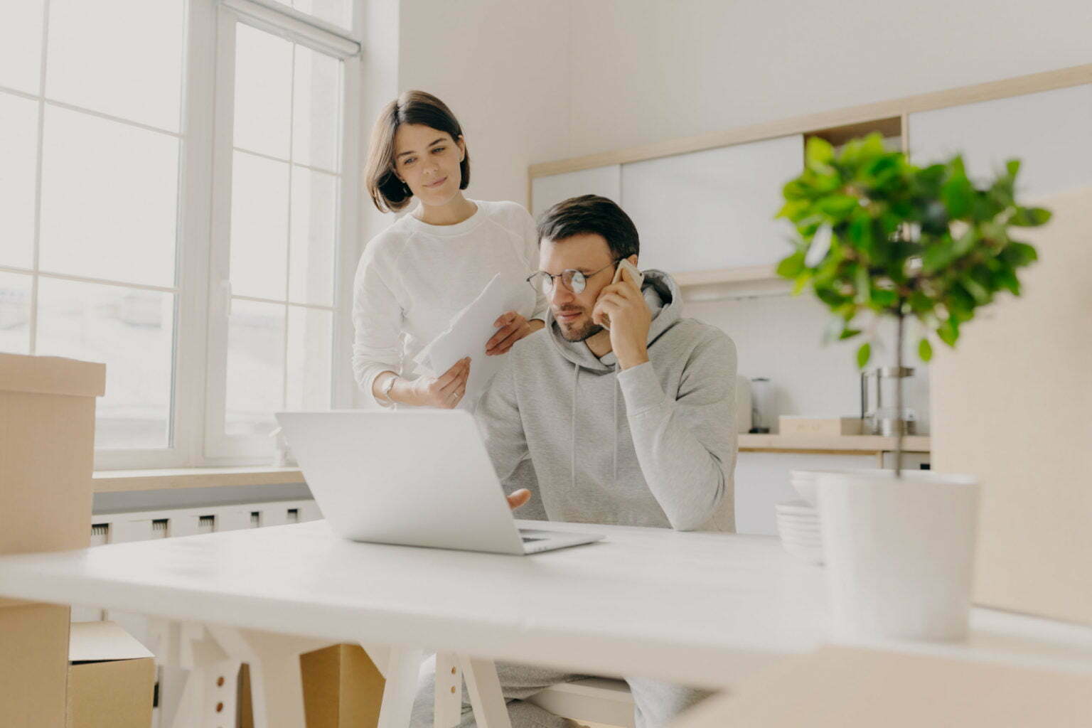 two people over a laptop