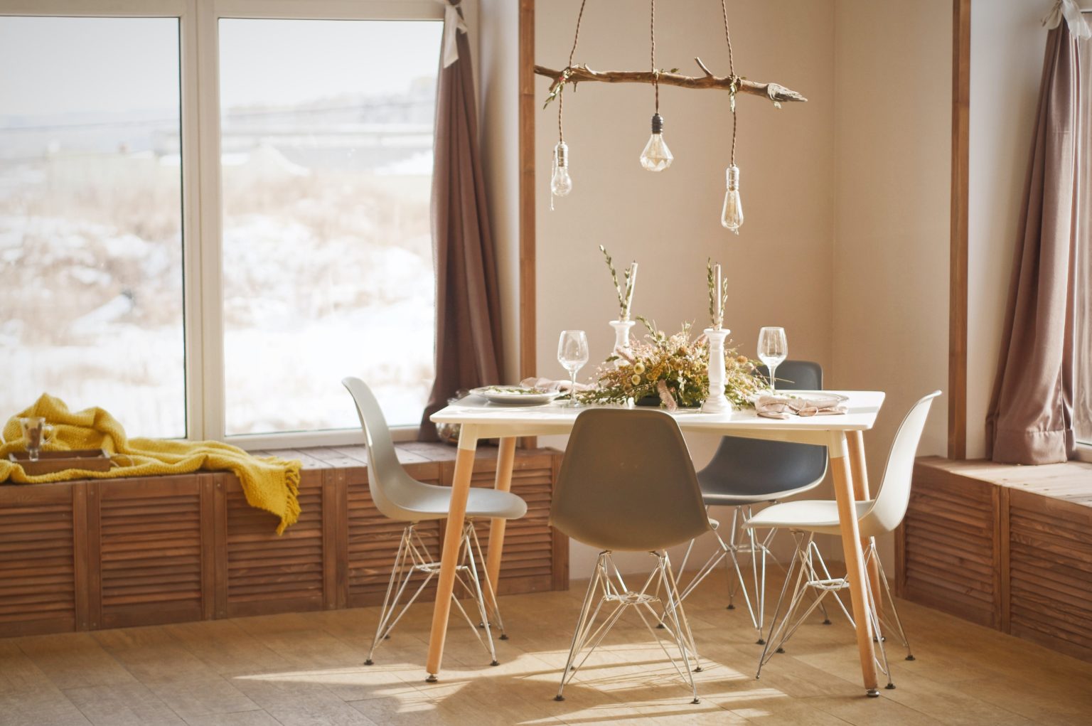 a dining table with chairs around it
